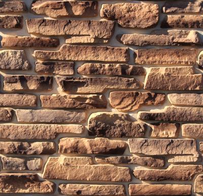 Камень искусственный White Hills 526-40 Морэй 6.2x2.6 / 49.5x12.3 / вариативный размер коричневый рельефный / матовый